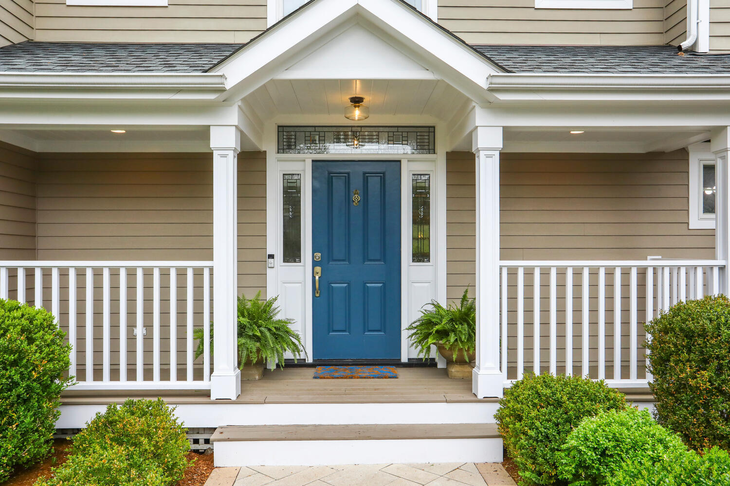 86 West Avenue Darien, CT 06820 - Photo 2 of 32 a front view of a house with a garden
