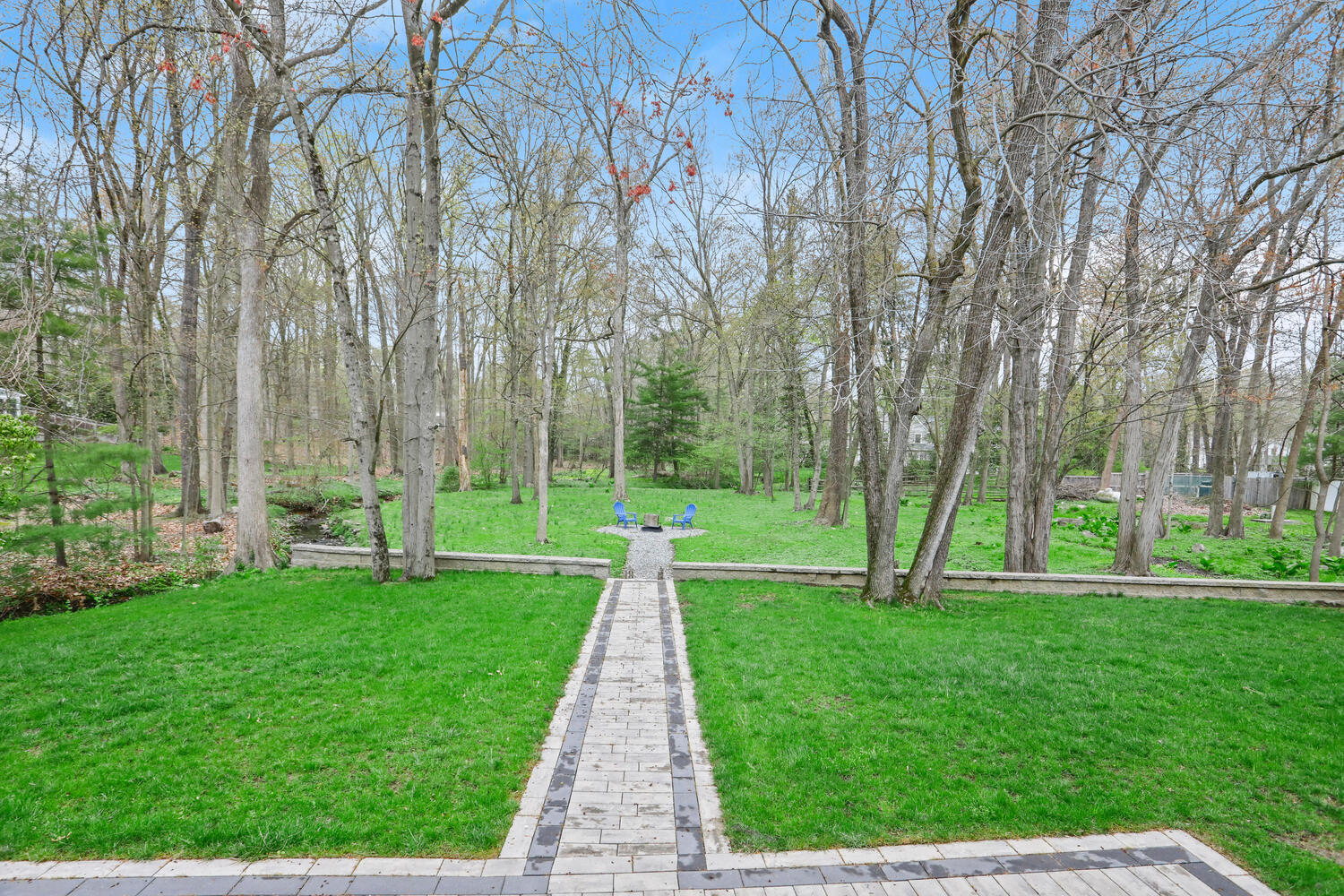 86 West Avenue Darien, CT 06820 - Photo 27 of 32 a view of a park with large trees