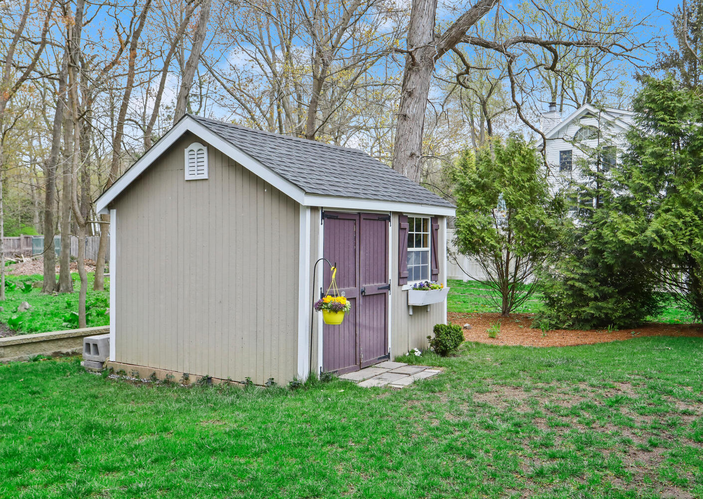 86 West Avenue Darien, CT 06820 - Photo 29 of 32 a house that has a tree in front of it