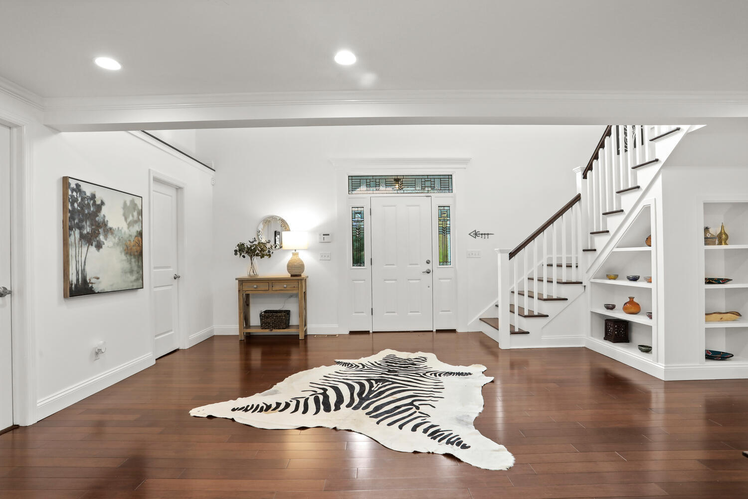 86 West Avenue Darien, CT 06820 - Photo 4 of 32 a living room with furniture and a wooden floor