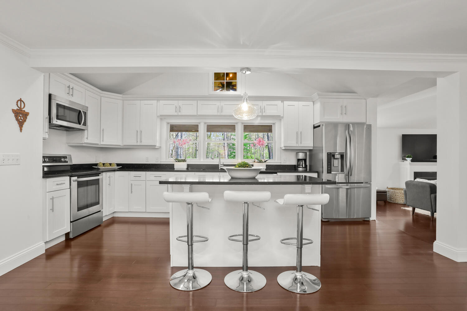 86 West Avenue Darien, CT 06820 - Photo 6 of 32 a kitchen with white cabinets and appliances