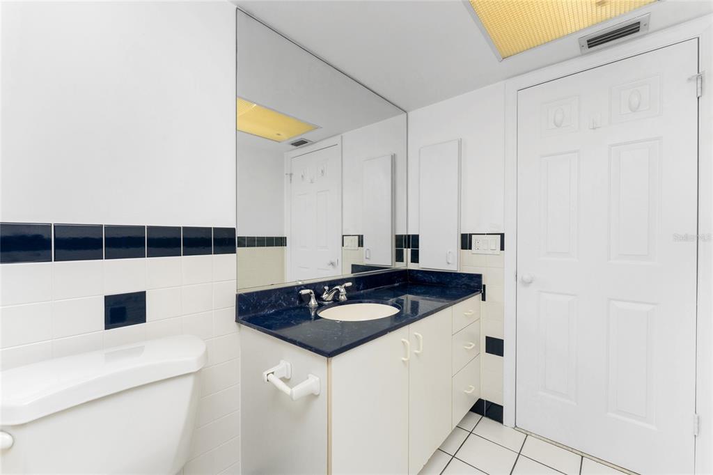 341 Severin Road Southeast Port Charlotte, FL 33952 - Photo 37 of 90 a kitchen with a sink and a stove top oven