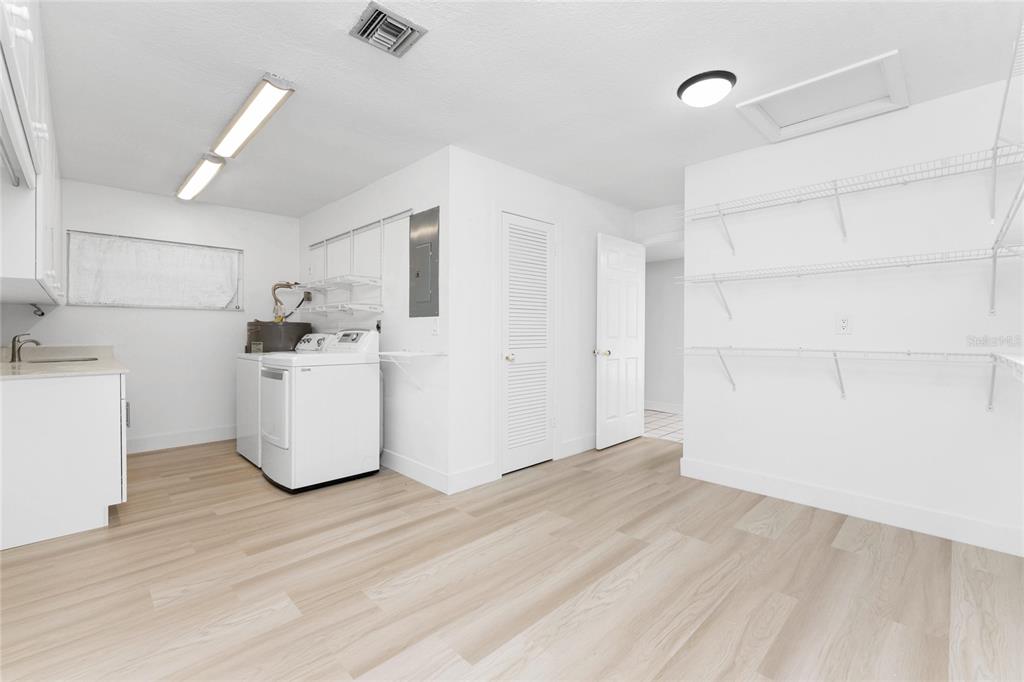 341 Severin Road Southeast Port Charlotte, FL 33952 - Photo 41 of 90 a view of a storage & utility room with a sink