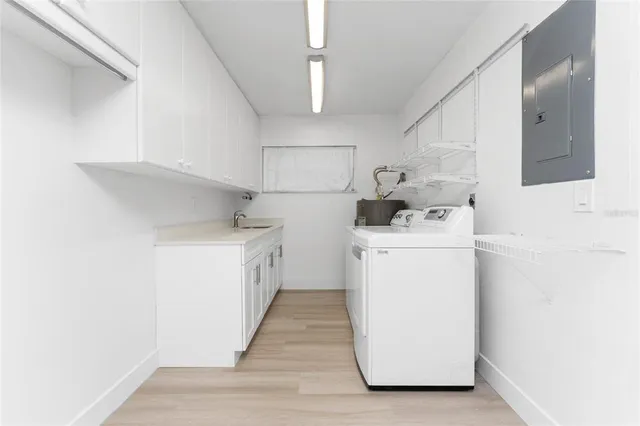 a bathroom with a shower and a sink