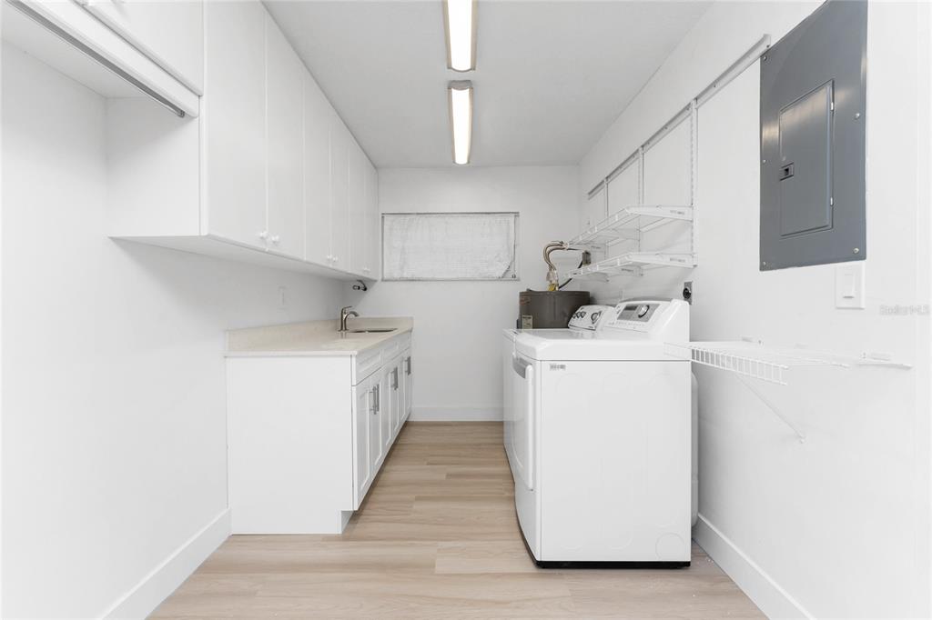 341 Severin Road Southeast Port Charlotte, FL 33952 - Photo 42 of 90 a utility room with dryer and washer