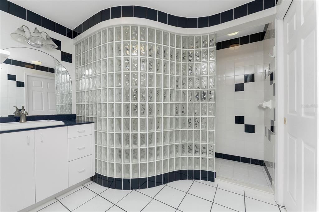 341 Severin Road Southeast Port Charlotte, FL 33952 - Photo 70 of 90 a bathroom with a shower and a sink