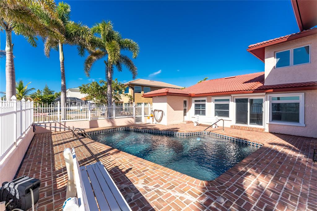 341 Severin Road Southeast Port Charlotte, FL 33952 - Photo 77 of 90 a view of a house with pool and sitting area