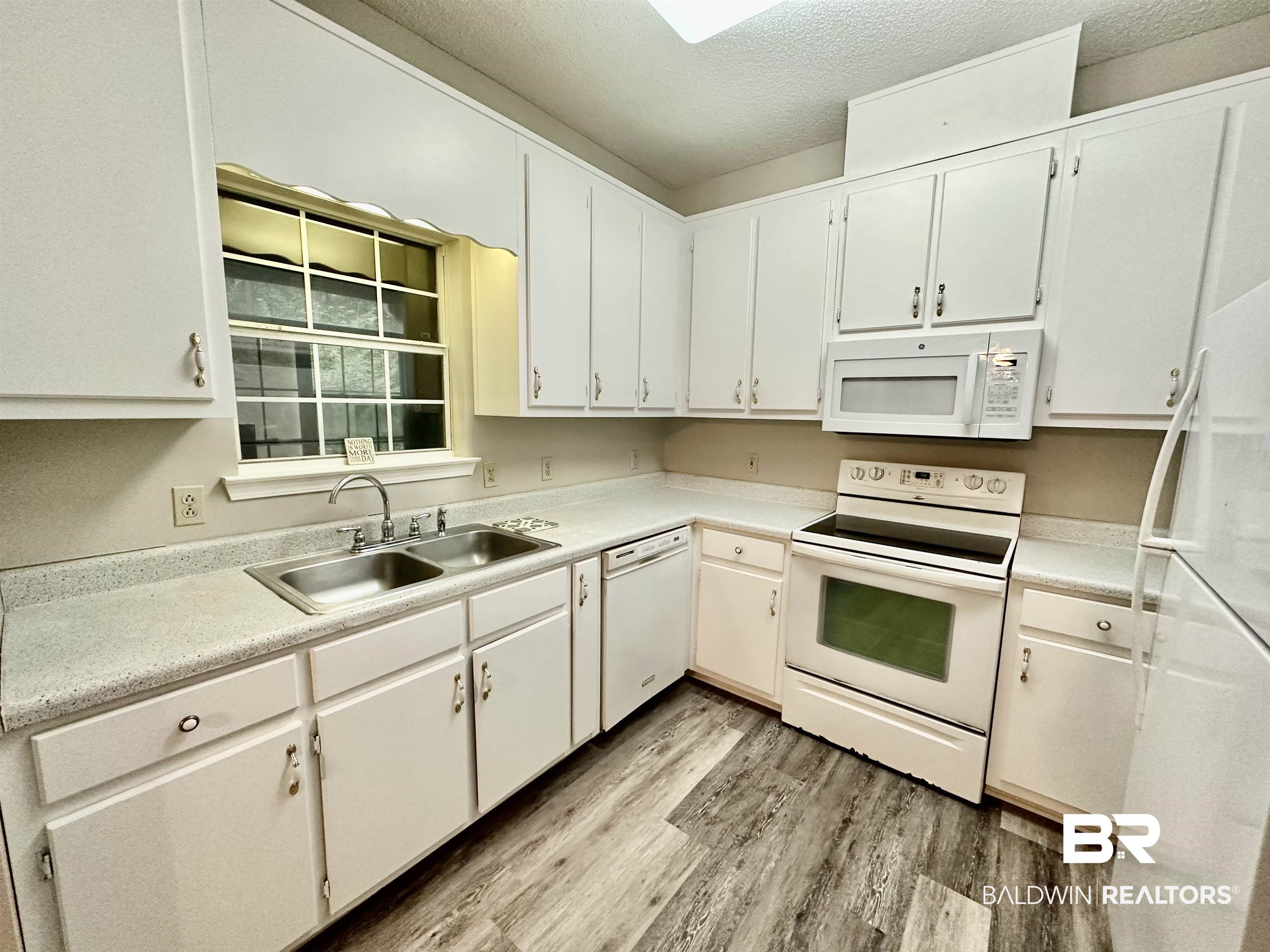 32349 Sibley Creek Road Daphne, AL 36527 - Photo 6 of 22 Kitchen with Fridge and pantry! Freshly painted