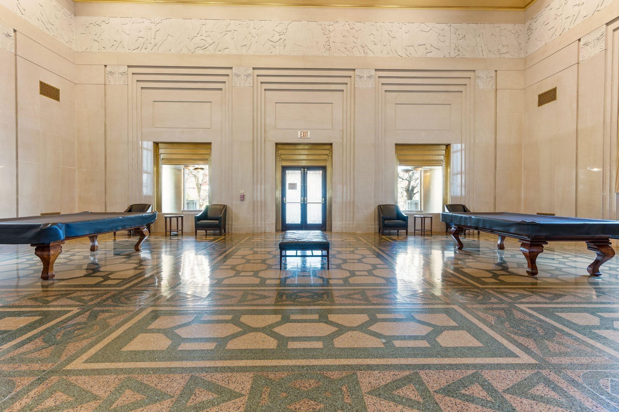 4 Beacon Way, Unit 222 Jersey City, NJ 07304 - Photo 19 of 20 a lobby with furniture and window