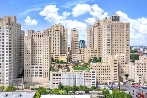 a view of a city with tall buildings