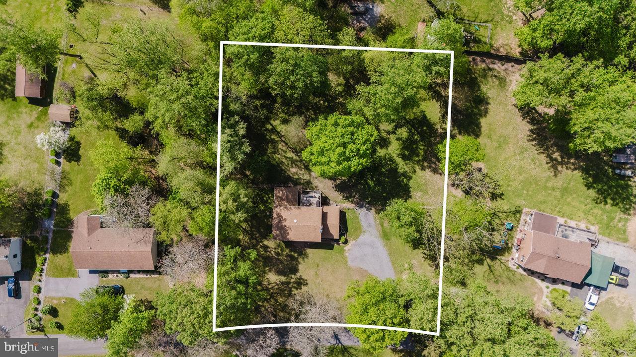 119 Canal Road Falling Waters, WV 25419 - Photo 2 of 66 an aerial view of house with yard