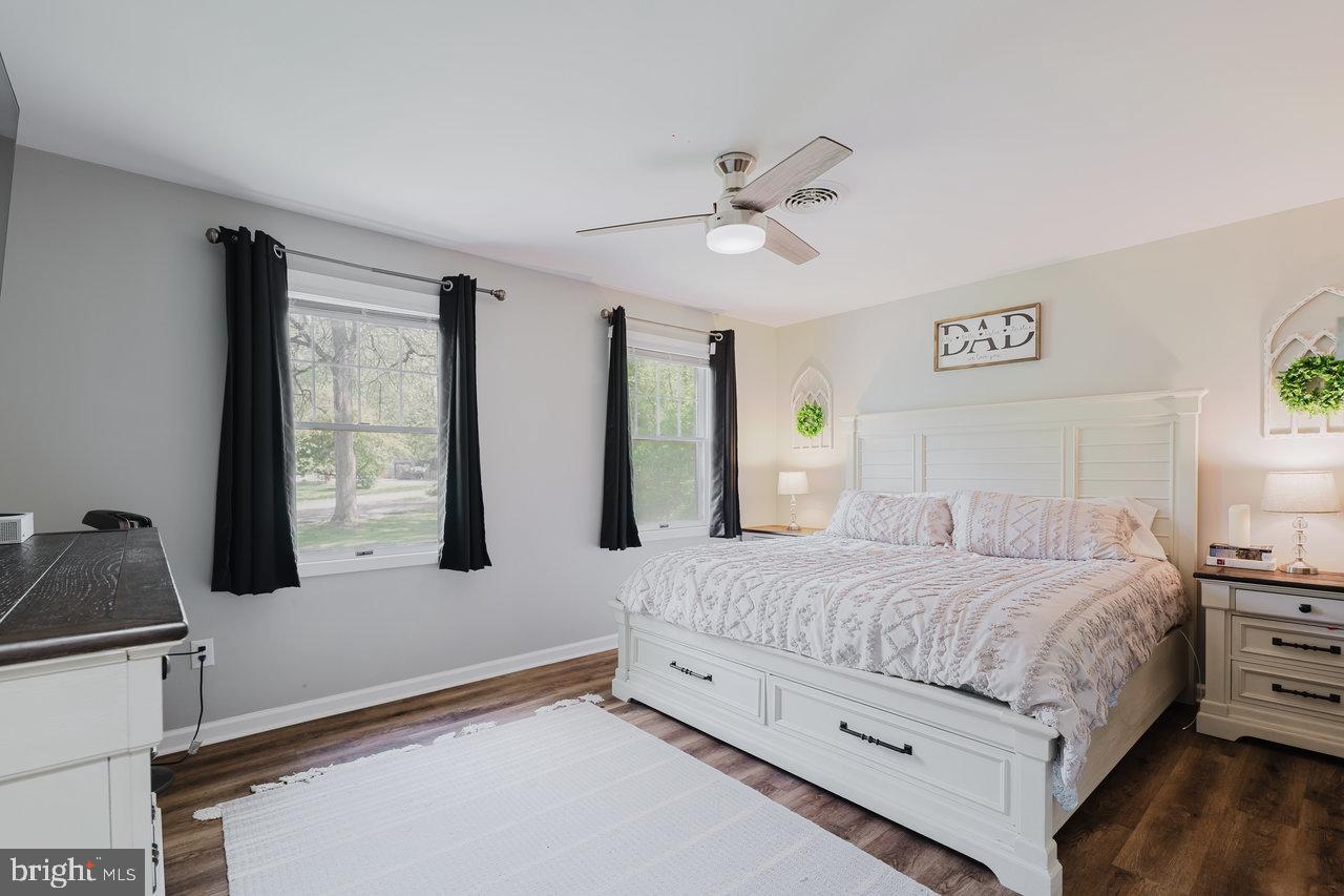 119 Canal Road Falling Waters, WV 25419 - Photo 22 of 66 a bedroom with a bed and a large window