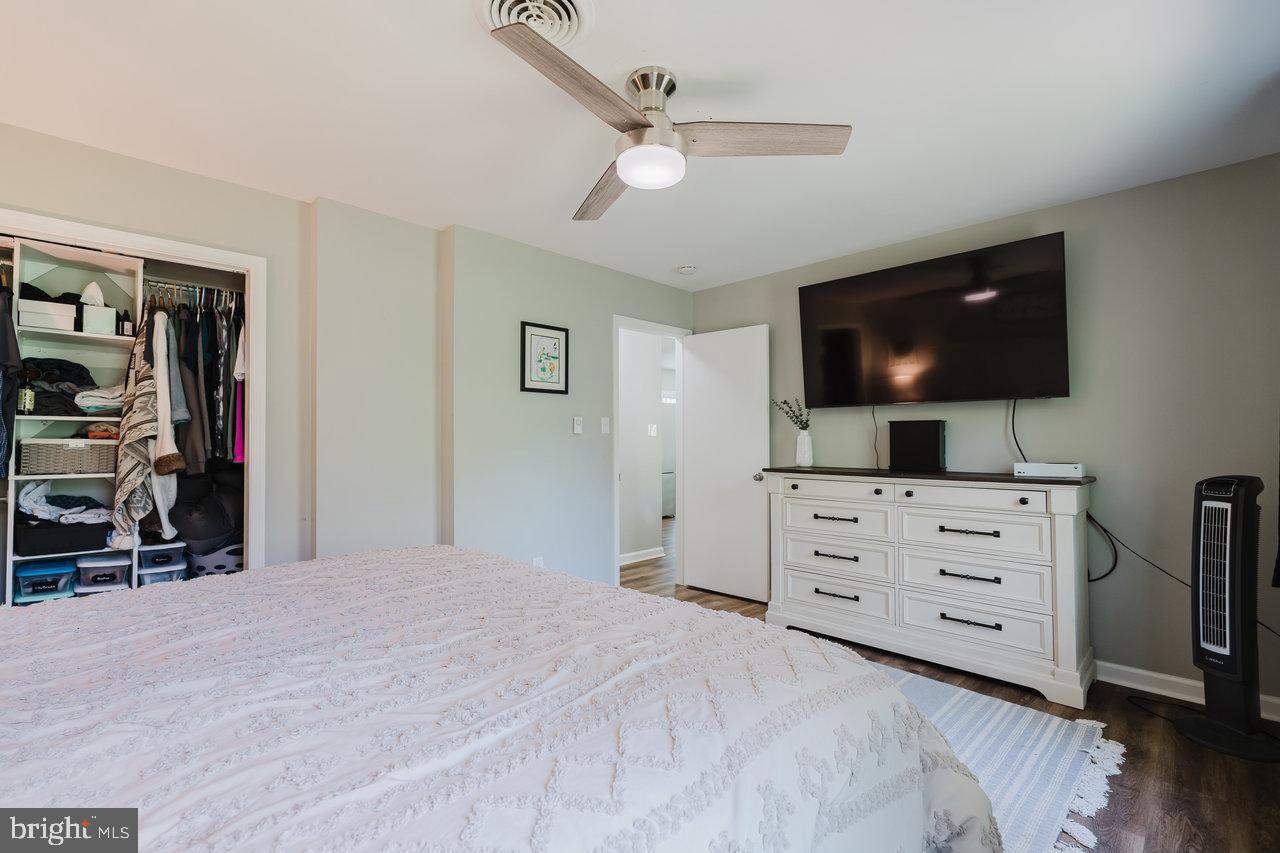 119 Canal Road Falling Waters, WV 25419 - Photo 25 of 66 a bedroom with a bed and a flat screen tv