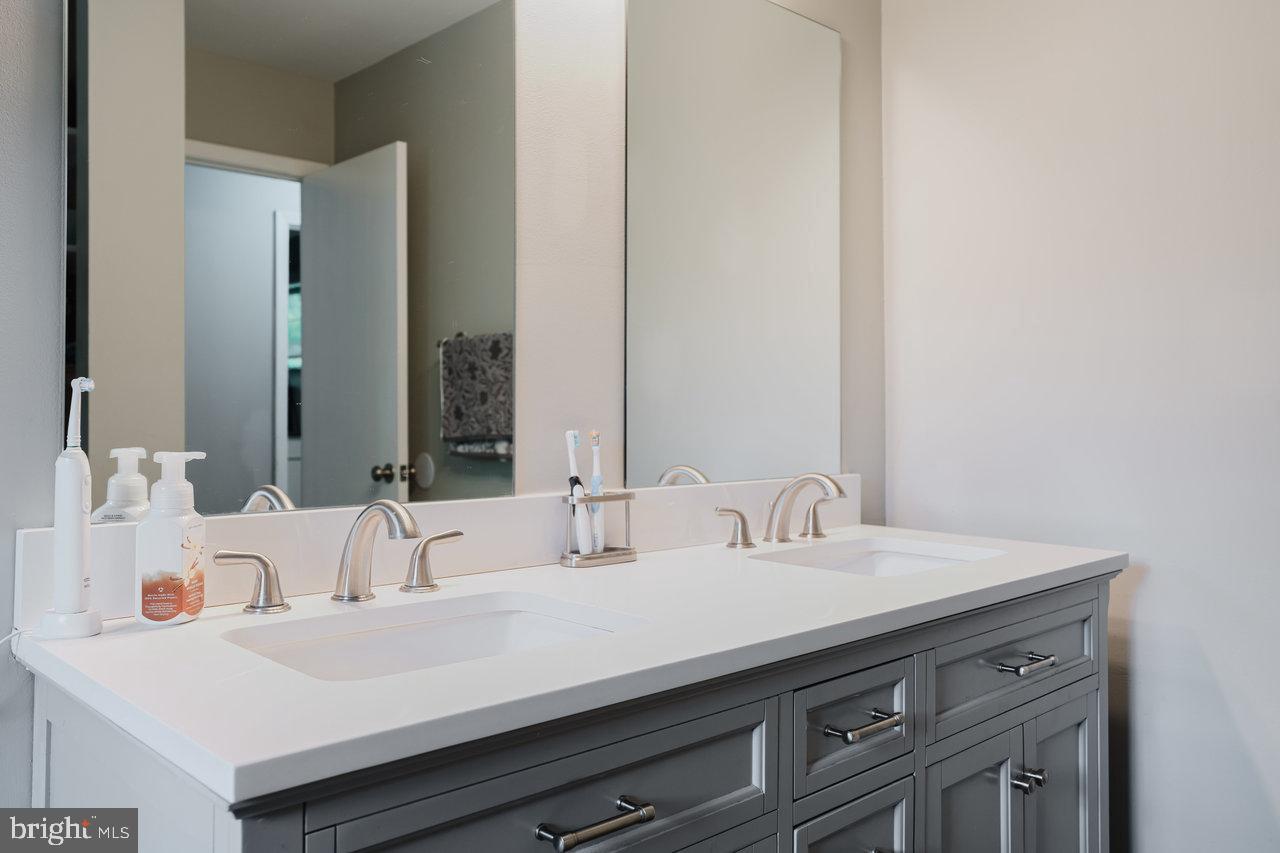 119 Canal Road Falling Waters, WV 25419 - Photo 27 of 66 a bathroom with a sink and a mirror