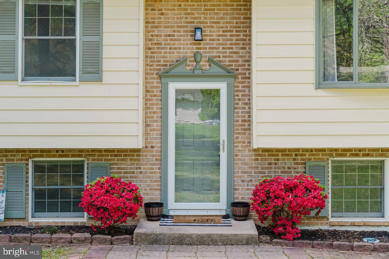 119 Canal Road Falling Waters, WV 25419 - Photo 42 of 66 a front view of a house with a potted plant