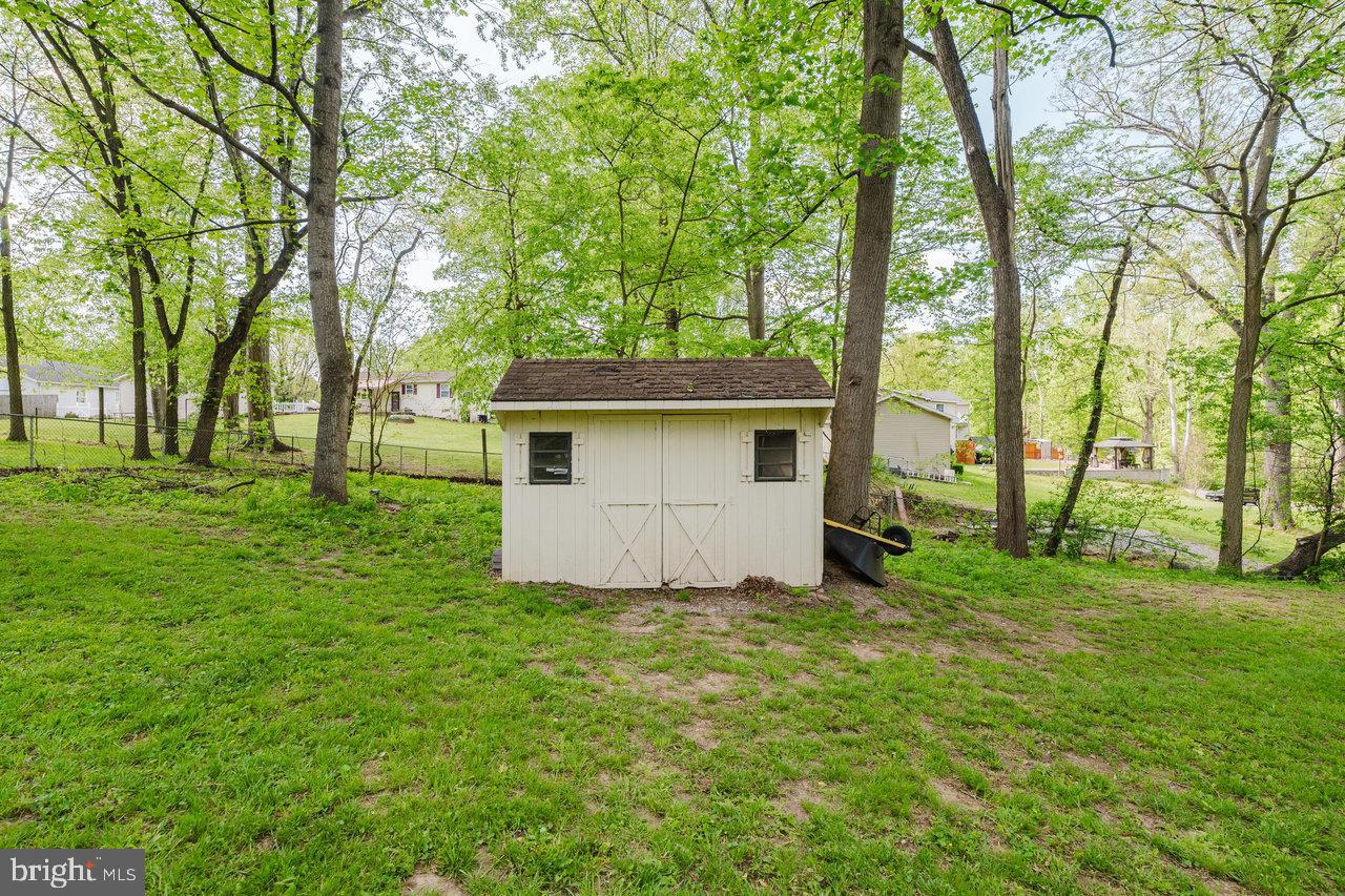 119 Canal Road Falling Waters, WV 25419 - Photo 49 of 66 a view of a house with backyard