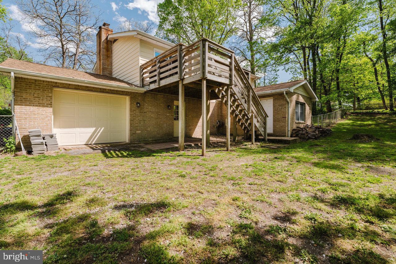 119 Canal Road Falling Waters, WV 25419 - Photo 54 of 66 a view of a house with yard and sitting area
