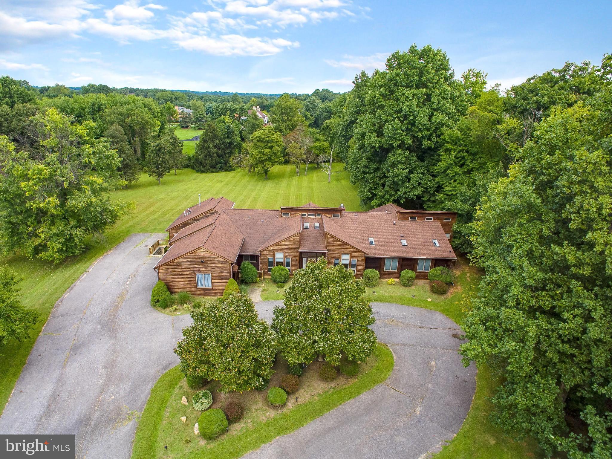 175 Norwood Road Silver Spring, MD 20905 - Photo 1 of 30 an aerial view of residential houses with outdoor space and trees all around