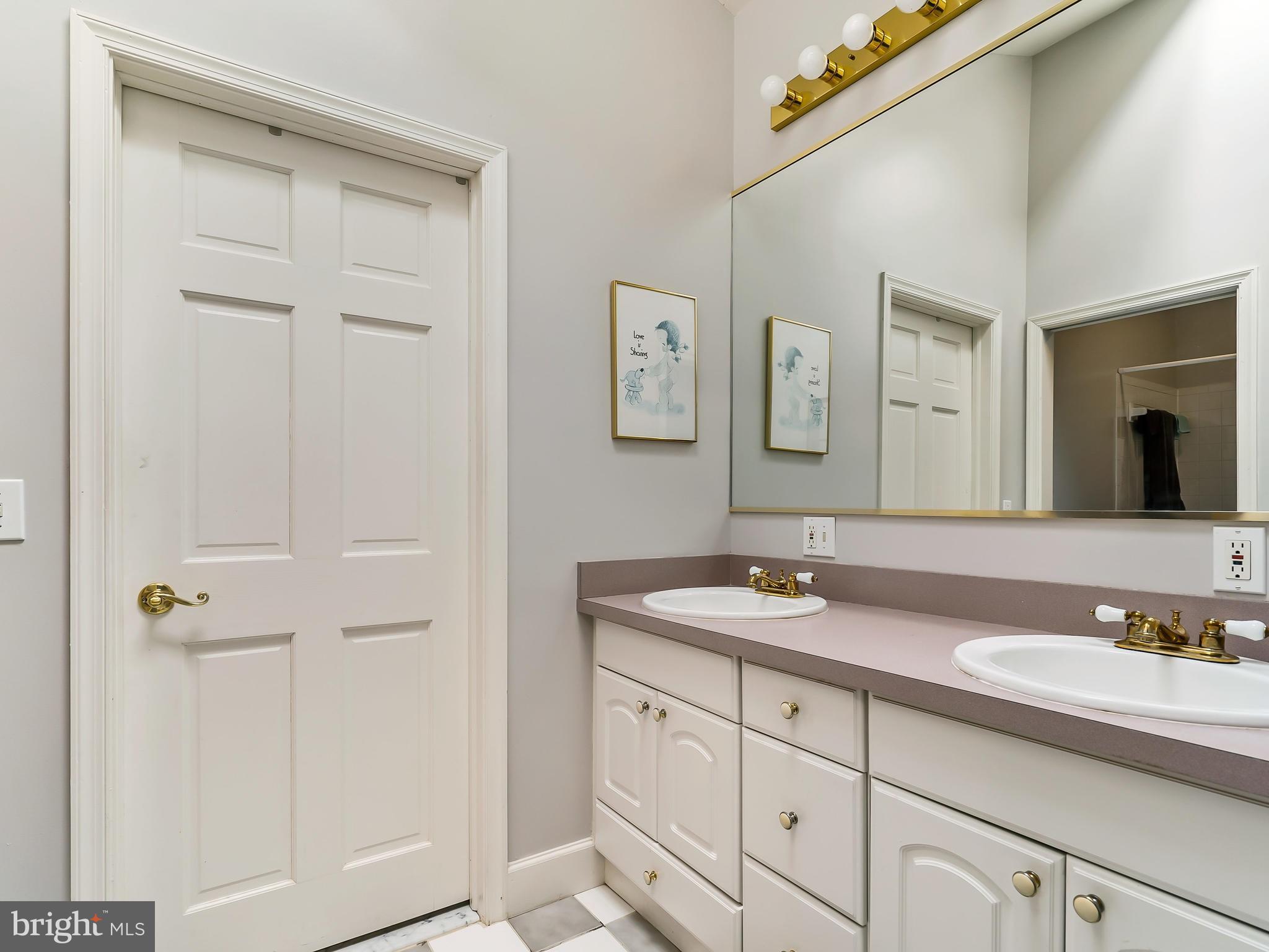 175 Norwood Road Silver Spring, MD 20905 - Photo 15 of 30 a bathroom with a granite countertop sink and a mirror