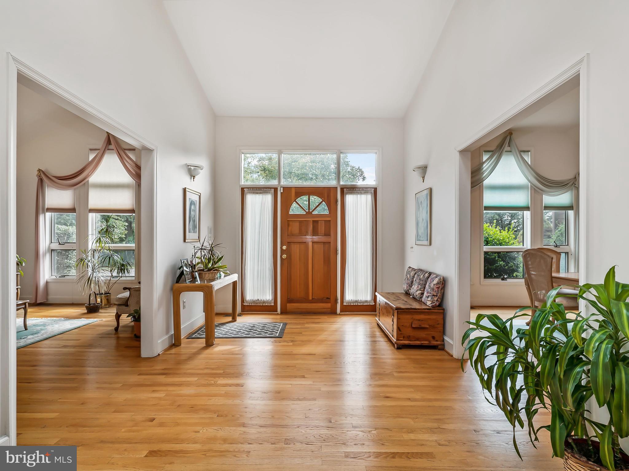 175 Norwood Road Silver Spring, MD 20905 - Photo 3 of 30 a living room with furniture large window and wooden floor