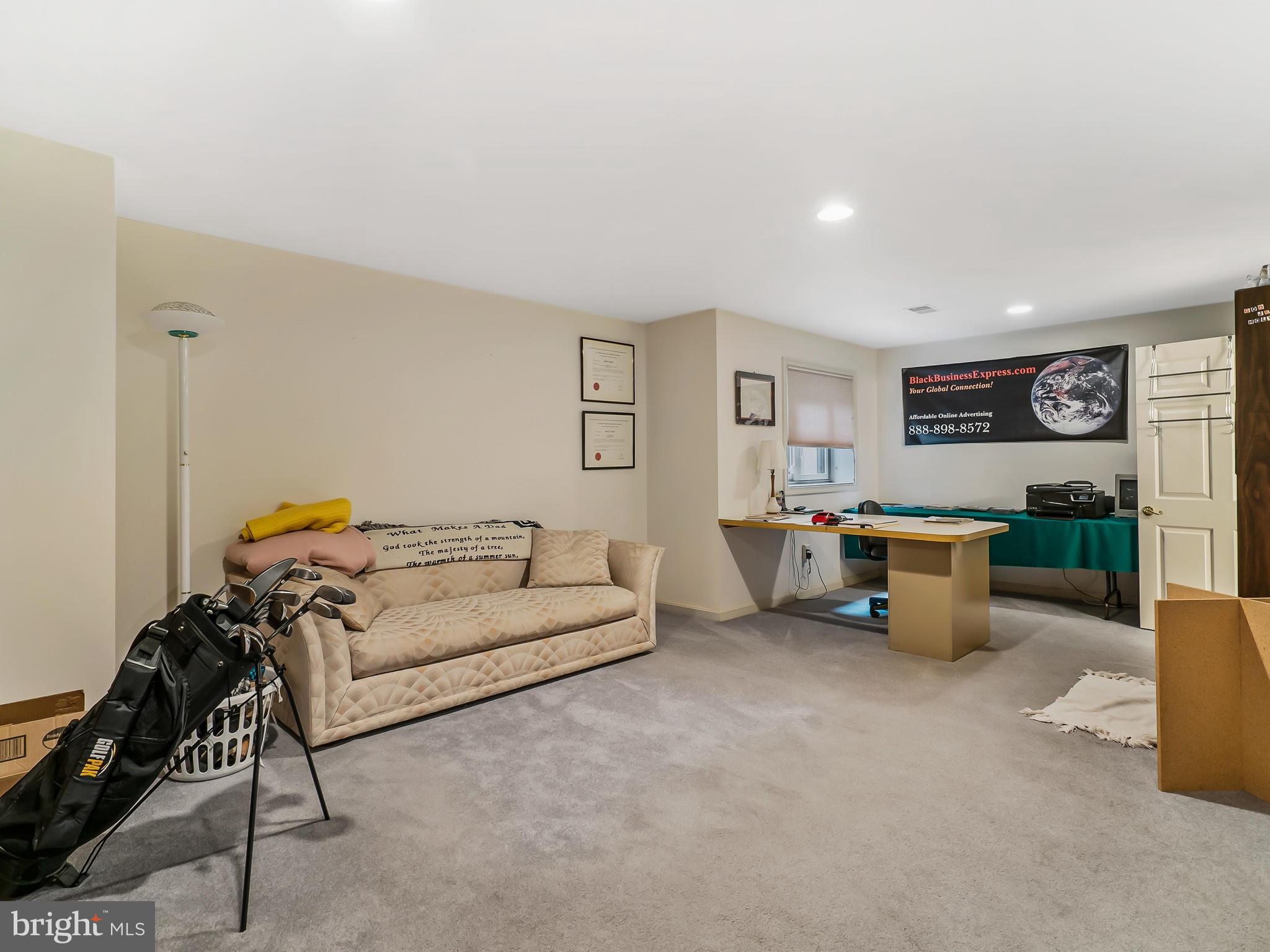 175 Norwood Road Silver Spring, MD 20905 - Photo 23 of 30 a living room with furniture and a couch