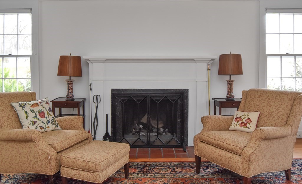 344 Flat Hills Road Amherst, MA 01002 - Photo 11 of 42 a living room with furniture and a fireplace