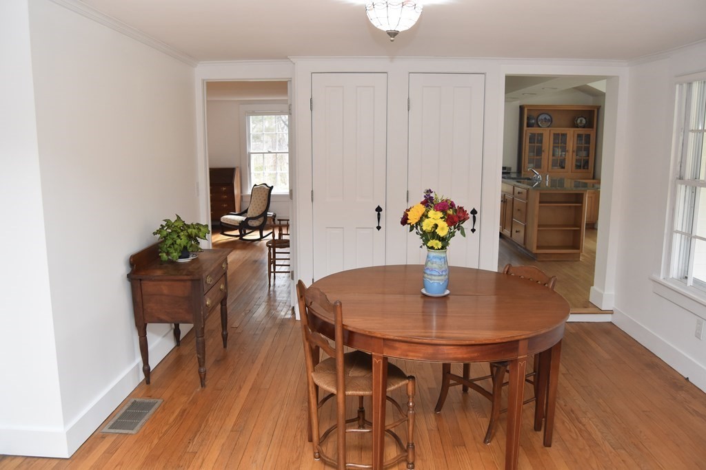 344 Flat Hills Road Amherst, MA 01002 - Photo 15 of 42 a dining room with furniture and wooden floor