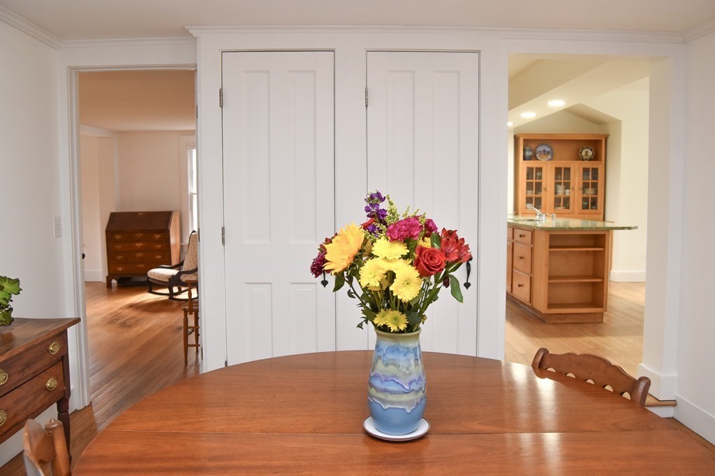 344 Flat Hills Road Amherst, MA 01002 - Photo 16 of 42 a glass vase with flowers on a table