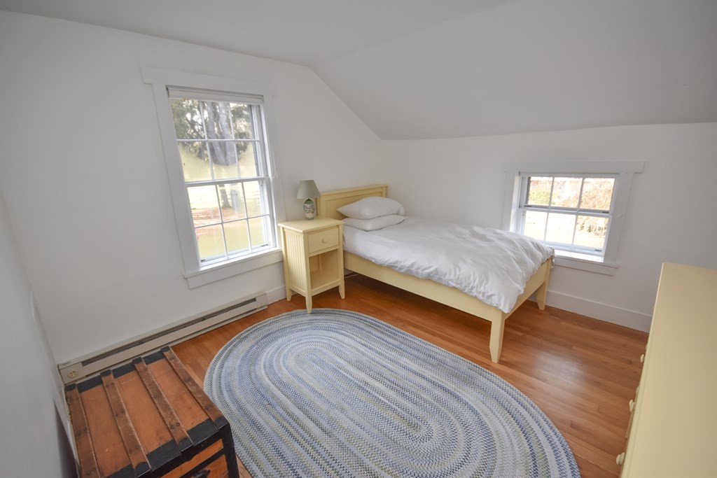 344 Flat Hills Road Amherst, MA 01002 - Photo 26 of 42 a bedroom with a bed and a window