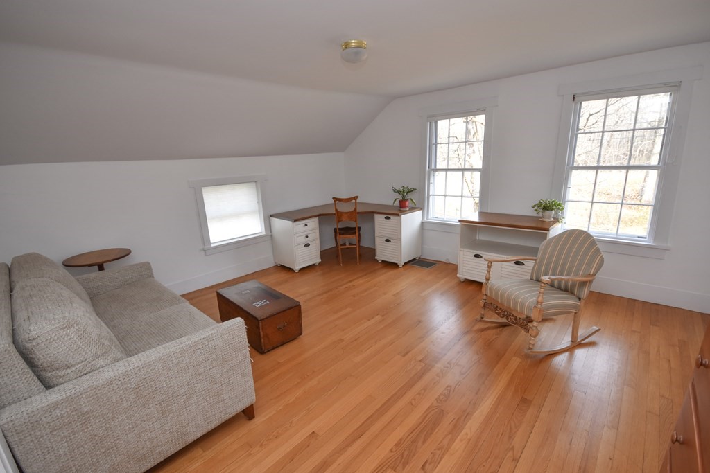 344 Flat Hills Road Amherst, MA 01002 - Photo 27 of 42 a living room with furniture and wooden floor