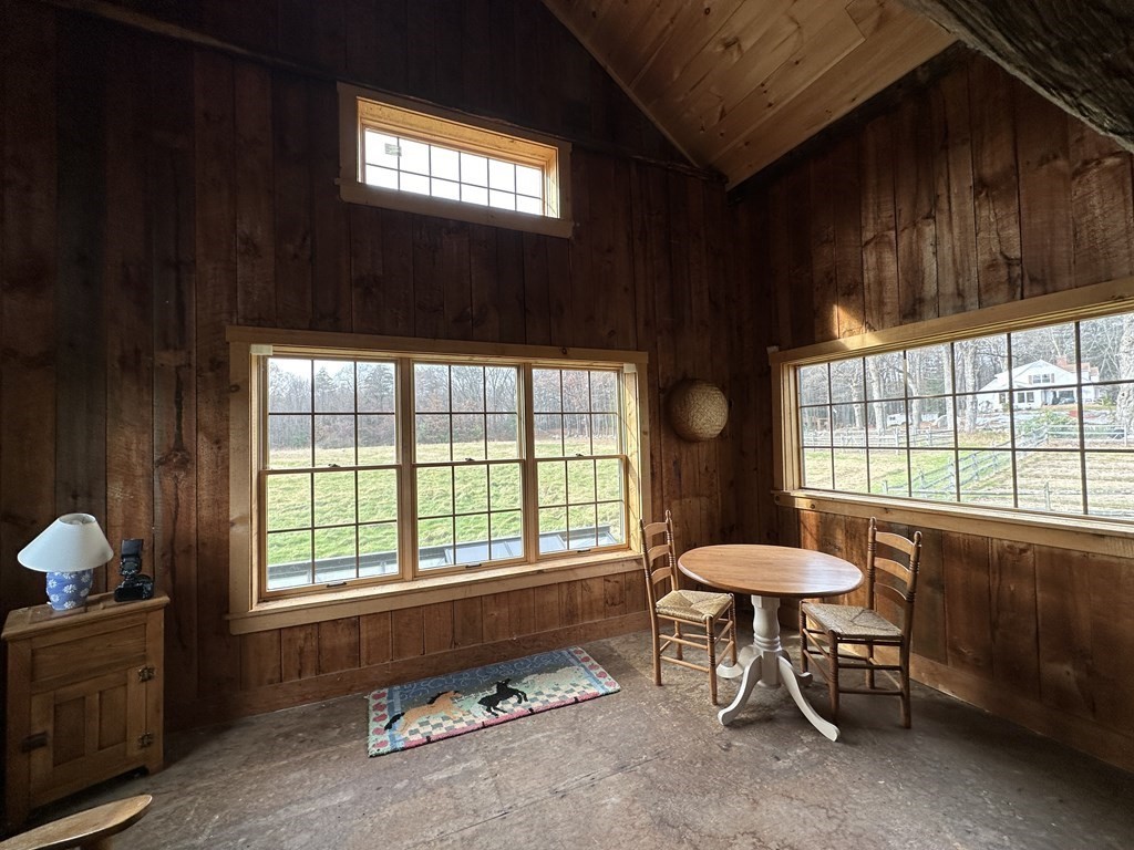 344 Flat Hills Road Amherst, MA 01002 - Photo 37 of 42 a living room filled with furniture and a window