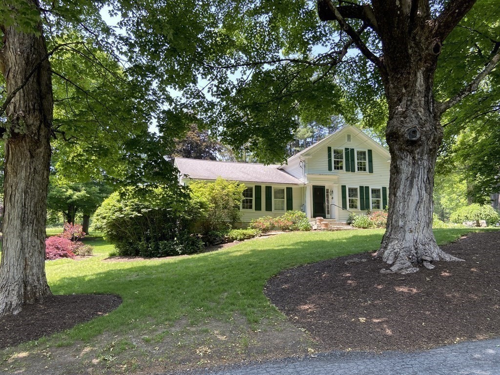 344 Flat Hills Road Amherst, MA 01002 - Photo 42 of 42 a front view of a house with a yard