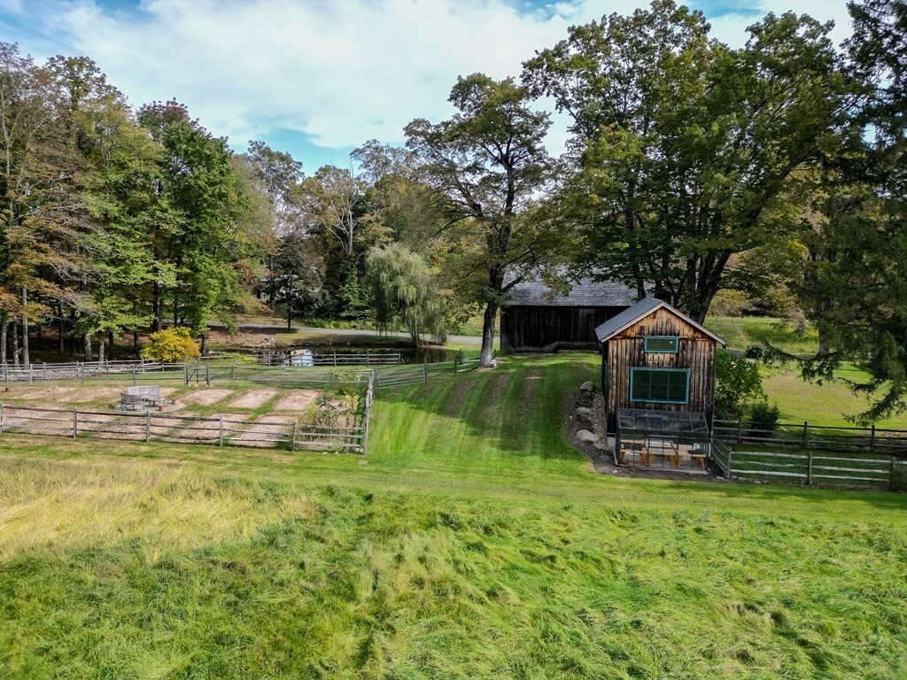 344 Flat Hills Road Amherst, MA 01002 - Photo 7 of 42 a view of a house with a yard