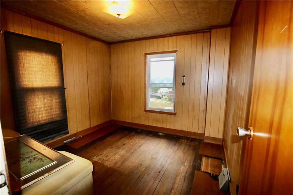 2997 Ruthwood Avenue Baldwin, PA 15227 - Photo 12 of 18 First floor bedroom with hardwood flooring