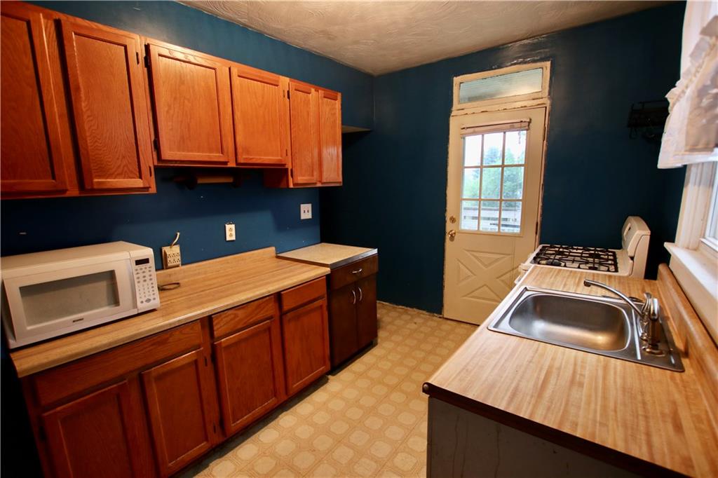 2997 Ruthwood Avenue Baldwin, PA 15227 - Photo 7 of 18 Kitchen with door leading to the back deck