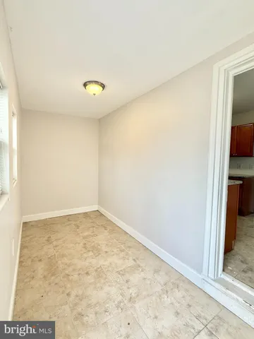 a view of a room with rack on the wall