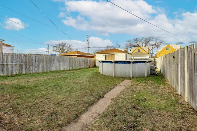 a view of a backyard with a barn