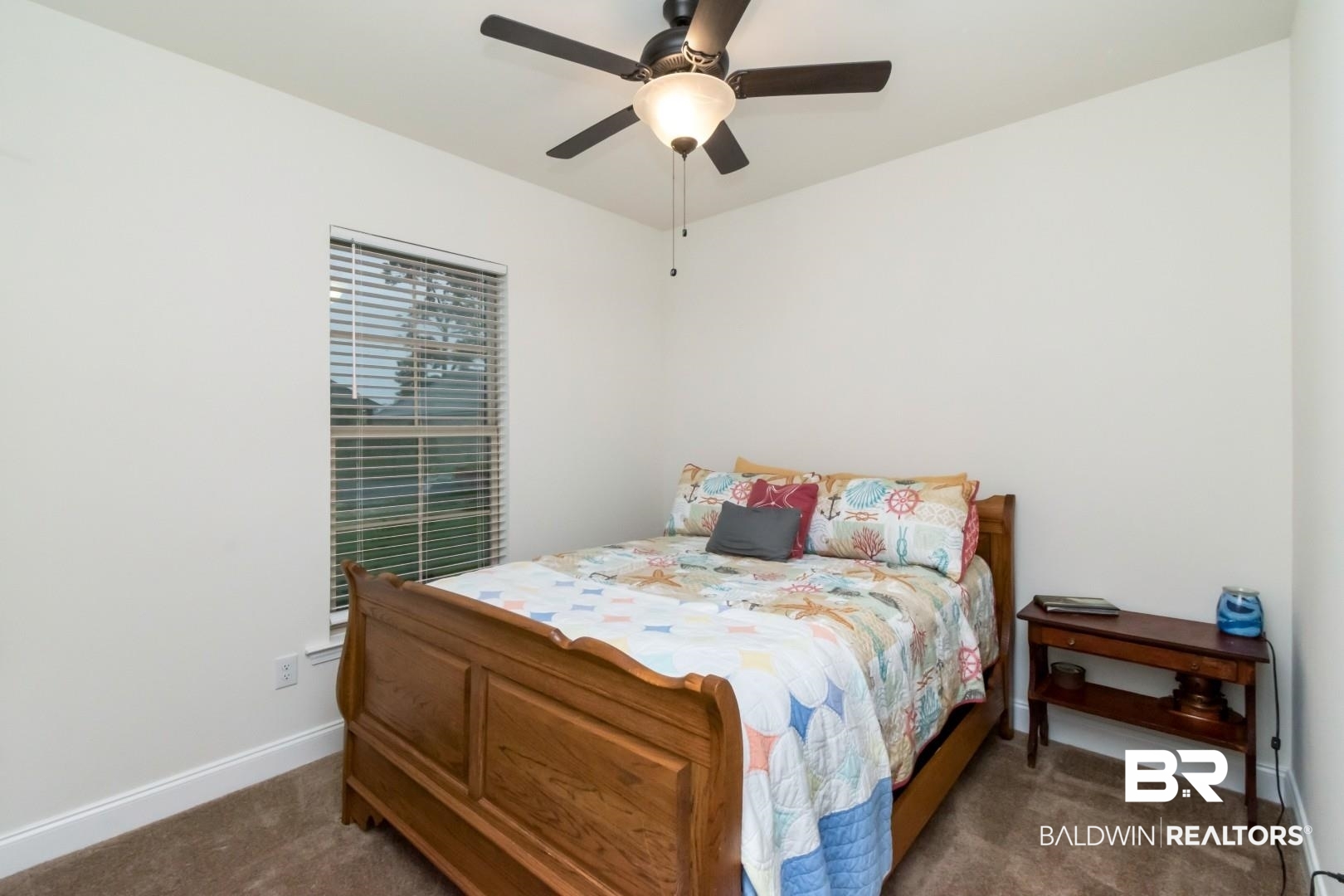10714 Brodick Loop Spanish Fort, AL 36527 - Photo 20 of 26 Bedroom featuring carpet floors and a ceiling fan