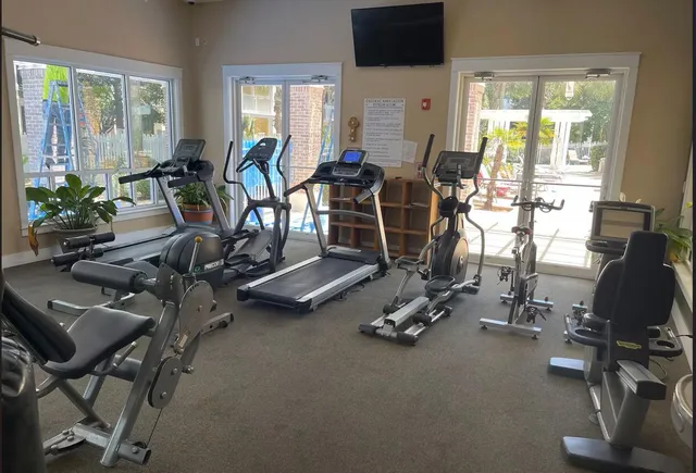 a view of a room with gym equipment