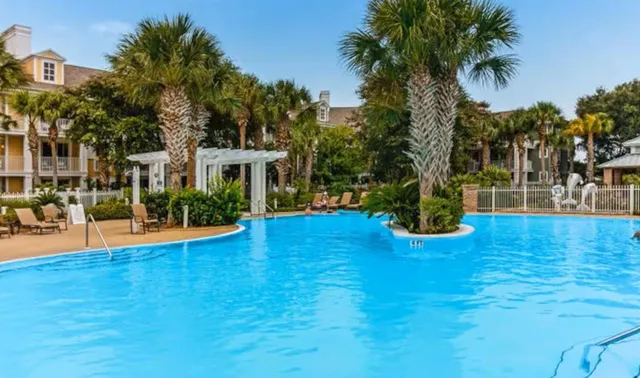 a view of a house with swimming pool