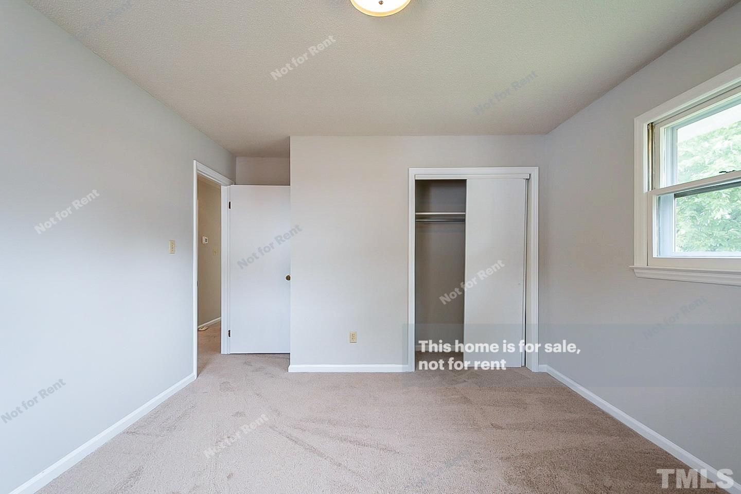 4120 Green Road Raleigh, NC 27604 - Photo 11 of 16 an empty room with windows