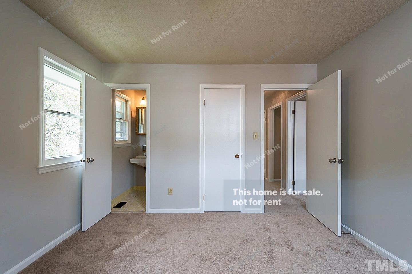 4120 Green Road Raleigh, NC 27604 - Photo 9 of 16 an empty room with windows and closet