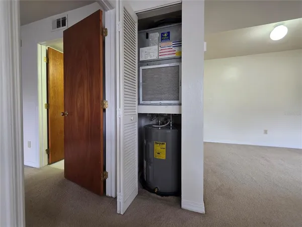 a view of a room with racks on the wall