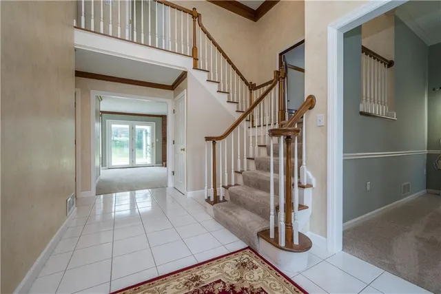a view of an entryway with a rug