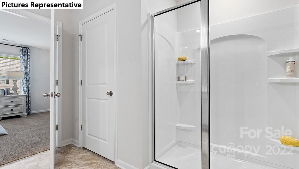5018 Fandango Road York, SC 29745 - Photo 16 of 29 a view of a bathroom with a shower and a sink