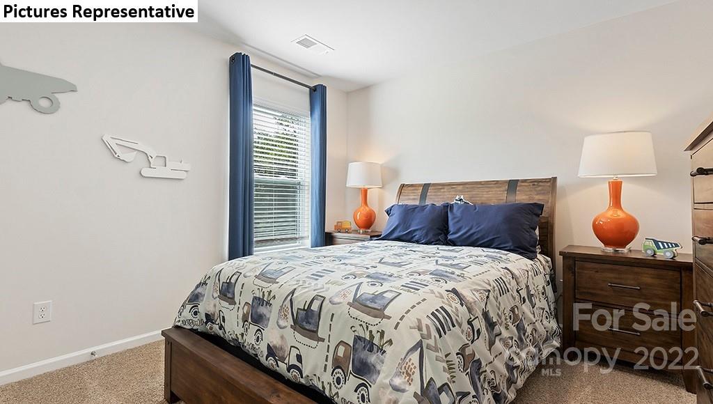 5018 Fandango Road York, SC 29745 - Photo 23 of 29 a bedroom with a bed and window