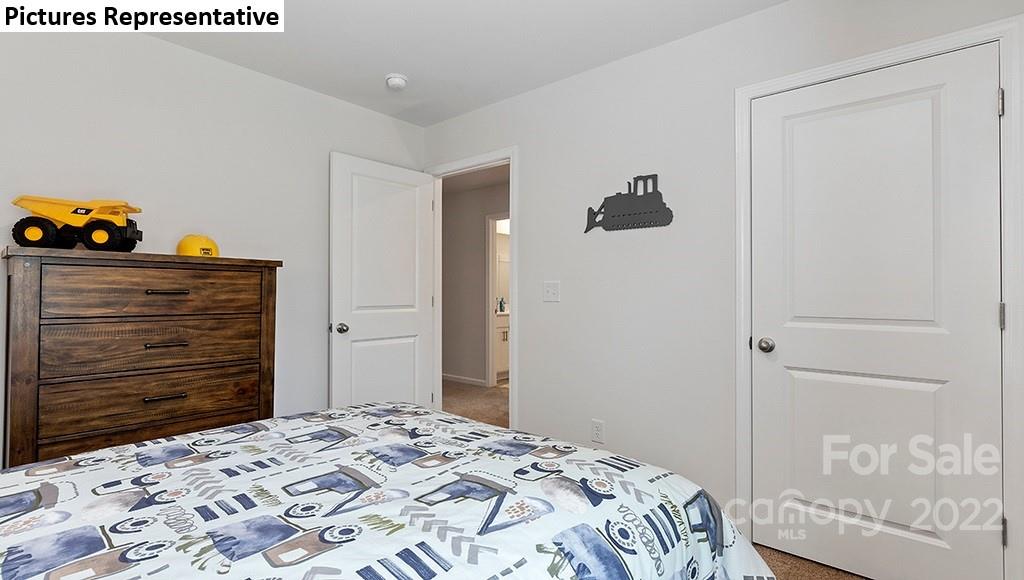 5018 Fandango Road York, SC 29745 - Photo 24 of 29 a bedroom with a bed and a dresser