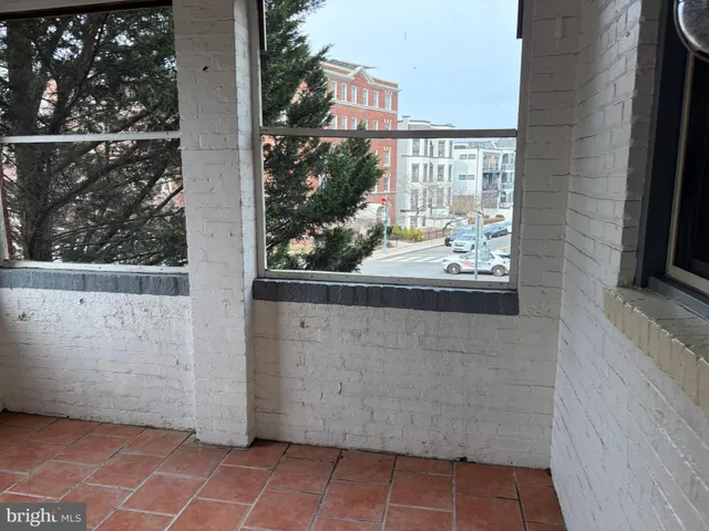 a view of a door and a window