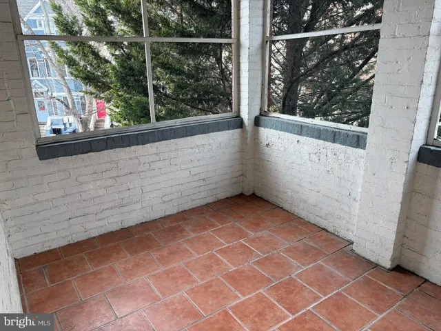 a view of a glass door and window