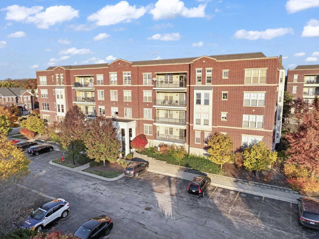 511 Prestwick Lane, Unit 302 Wheeling, IL 60090 - Photo 22 of 24 a city view with tall buildings